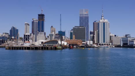 Close-panning-shot-of-Commercial-Bay-on-clear-day,-Auckland-City,-New-Zealand