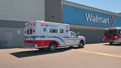 Bay-Cities-Ambulance-And-Firetruck-In-Front-Of-Walmart-In-Coos-Bay,-Oregon-During-Corona-Pandemic-In-USA