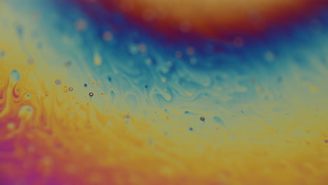Fascinating-shot-of-a-multi-colored-liquid-moving-through-the-frame,-color-changing