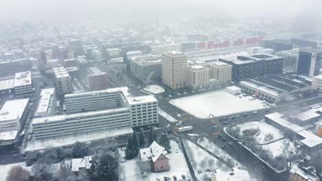 flying-in-a-snow-blizzard-over-urban-area