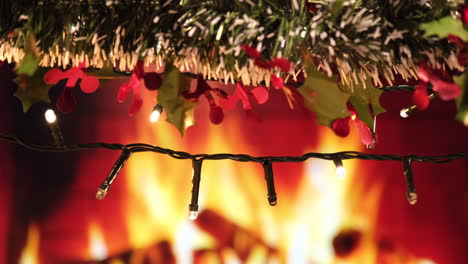 Christmas-lights,-garland-and-fireplace-at-home