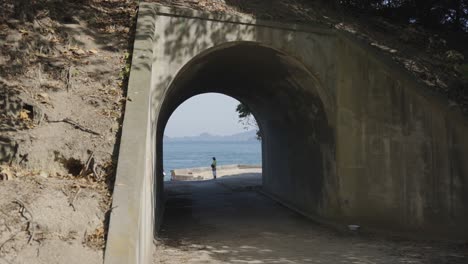 Tunnel-leading-to-inland-sea-of-Japan-from-Okunoshima,-Hiroshima-Japan