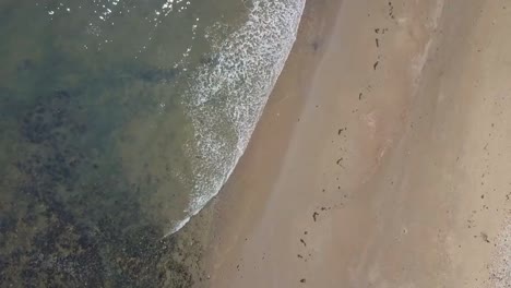 Aerial-birds-eye-view-drone-view-of-Seaburn-Beach,-Sunderland,-North-East-England