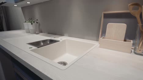 A-kitchen-showroom-gimbal-shots-of-bench-and-faucet