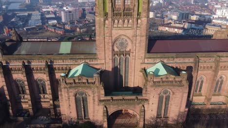 Liverpool-Anglican-cathedral-historical-gothic-landmark-aerial-building-tilt-up-overlooking-city-skyline