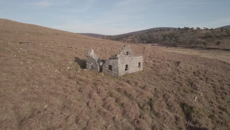 Exterior-Of-Old-And-Abandoned-Building-On-Hill-Of-Wicklow-Mountains-During-Summer-In-Ireland