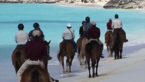 Horse-ride-on-the-beach-in-Half-Moon-Cay,-Bahamas