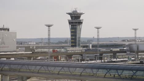 Panning-up-of-the-control-and-surveillance-tower-in-Paris-Orly-airport