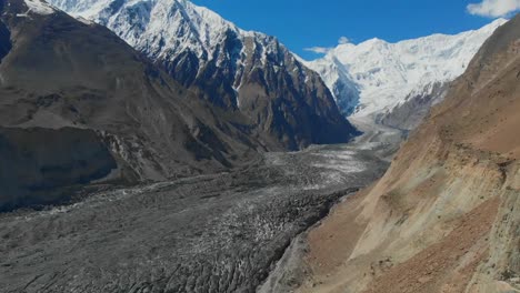 Aerial-Over-Hopar-Glacier-In-Nagar-Valley-With-Snow-Capped-Mountains