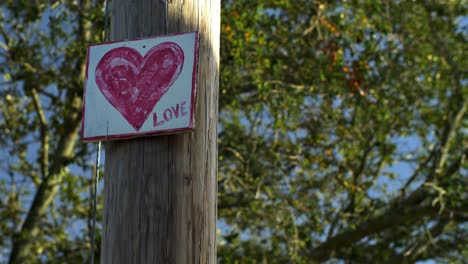 Street-Art-Telephone-Pole-Love-Heart-Sign