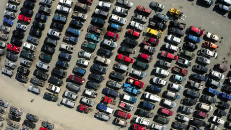Aerial-view-over-a-large-junkyard-full-of-cars