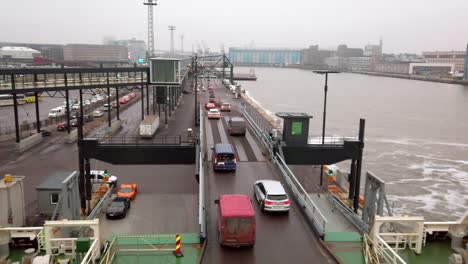 Cars-leaving-the-ferry-after-departing-at-Finland,-Helsinki