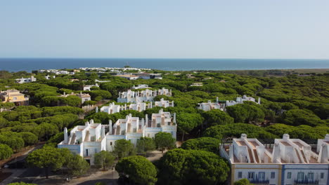 Ascend-Aerial-shot-of-private-luxury-resort-apartments-in-Portugal-during-summer---Praia-Verde,Algarve
