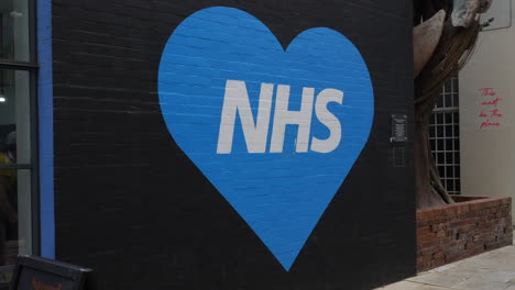 Love-NHS-blue-heart-wall-art-mural-in-support-of-the-the-British-national-health-service-in-Birmingham