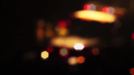 Bokeh-blur-on-a-black-background-multicolored-lens-flare-on-a-black-background