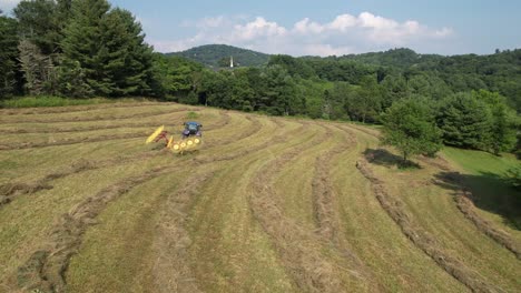 beautiful-farm-scene-of-hay-being-harvested-near-boone-nc,-north-carolina