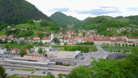 Small-city-beside-river-with-spa-centrum-and-large-brewery-with-castle-on-the-hill