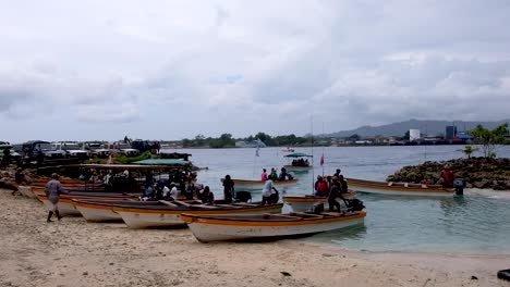People-on-water-taxi-boats-on-Buka-Passage-waiting-for-their-next-passenger-on-the-remote-tropical-island-Autonomous-Region-of-Bougainville,-Papua-New-Guinea