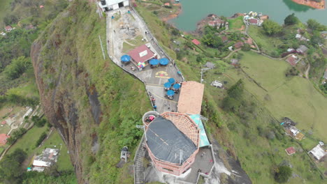 Top-View-Of-El-PeÃ±Ã³n-de-GuatapÃ©---The-Rock-of-Guatape-in-Antioquia,-Colombia---aerial-drone-shot
