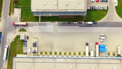 Aerial-view-of-logistics-center,-warehouses-near-the-highway