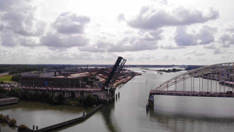 Aerial-View-Of-Opened-Bascule-Bridge-Over-Noord-River