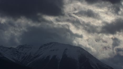 Mountain-peak-with-clouds-and-light-snow-Time-lapse