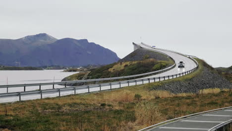Car-Driving-Down-At-The-Atlantic-Ocean-Road-Of-County-Road-64-In-More-Og-Romsdal-County,-Norway