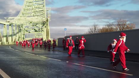 Slow-motion-Charity-Santa-dash-winter-fun-run-across-Runcorn-Silver-Jubilee-bridge