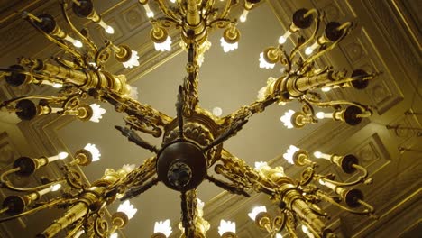 Old-lit-chandelier-in-the-palace