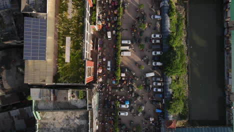 Top-View-Of-The-Crowd-At-The-Street-Beside-The-High-Rise-Building