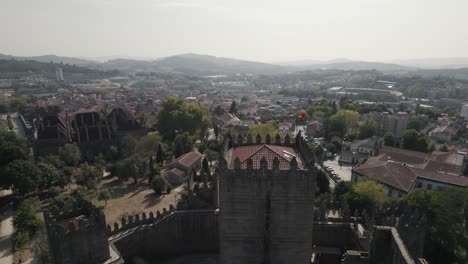 Low-drone-flight-over-medieval-Guimaraes-Castle-grounds