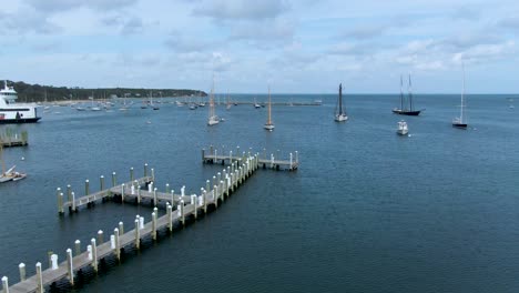 Sailboats-Anchored-Near-The-Jetty-In-Vineyard-Heaven-Pier-In-Cape-Cod,-Ma,-USA