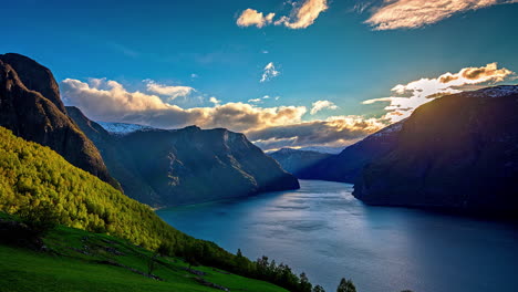 Sunrise-time-lapse-over-dramatic-fjord-landscape,-epic-beauty