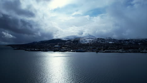 Moody-arial-view-over-Sortland-in-Northern-Norway,-North-Scandinavia,-ascending-pedestal-shot---LangÃ¸ya