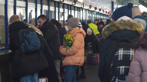 2022-Russian-invasion-of-Ukraine---Central-Railway-Station-in-Warsaw-during-the-refugee-crisis---people-on-the-line-to-the-cashiers
