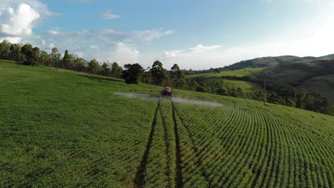 Tractor-spraying-soybean-plantation-in-Brazil