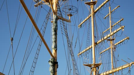 Tilting-shot-of-three-masts-of-tall-ship-boat-hotel-Alexander-Von-Humboldt-in-Bremen