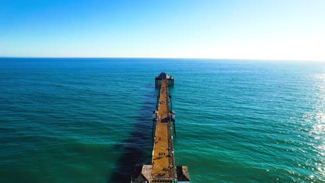 Oceanside-pier-drone-shot-over-the-ocean