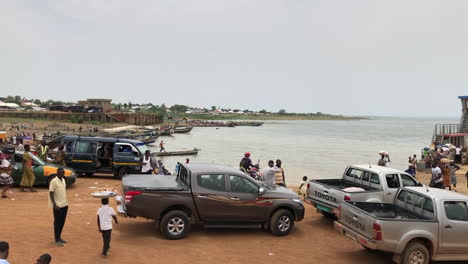 line-of-cars-waiting-to-board-a-ferry-to-cross-lake-volta,-Africa
