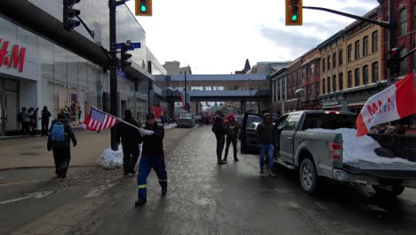 POV-Walking-Along-Downtown-Street-Past-Peaceful-Protest-For-Freedom-Convoy-In-Ottawa-On-January-28-2022