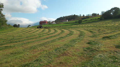 Tractor-And-Baler-Collects-Cut-Fodder-For-Silage-Production