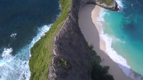 Wonderful-aerial-view-flight-bird's-eye-view-drone-shot-to-the-path-on-the-edge-high-in-the-sky-at
Kelingking-Beach-at-Nusa-Penida-like-Jurassic-Park