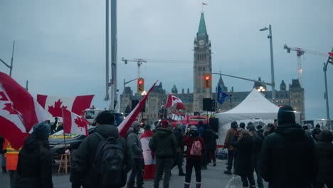 Freedom-Convoy-2022---Protesters-In-Front-Of-The-Peace-Tower-On-Parliament-Hill-In-Ottawa,-Ontario-Canada