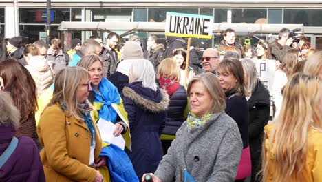 Crowd-of-people-at-Ukraine-anti-war-protest-activists-on-Manchester-city-street