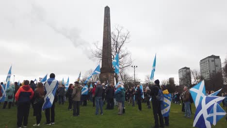 People-gather-next-to-the-Nelson-Monument-on-Glasgow-Green