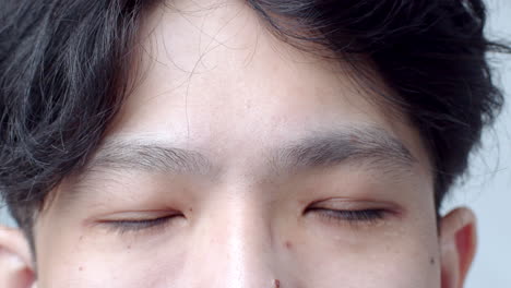 Close-up-of-Asian-Man's-face