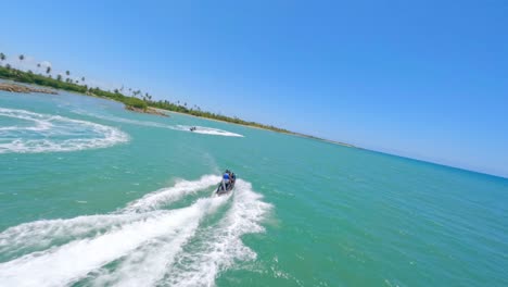Tourists-Enjoying-Jet-Ski-Ride-In-The-Caribbean-Sea-In-Summer