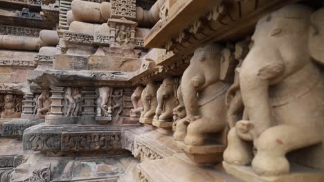 Elephant-stone-sculptures-at-Western-Group-of-Temples-at-Khajuraho,-UNESCO-World-Heritage-site