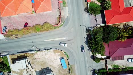 Overhead-jib-down-view-of-an-intersection-in-the-streets-of-Willemstad,-Curacao,-Dutch-Caribbean-island