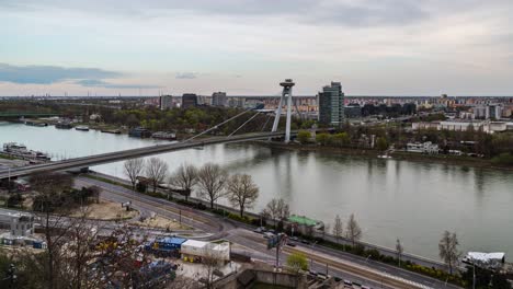 UFO-or-SNP-Bridge-in-Bratislava,-Slovakia,-time-lapse-view-of-blurry-traffic